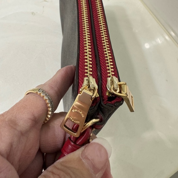 Coach Brown Wristlet with double zip Red Zippers